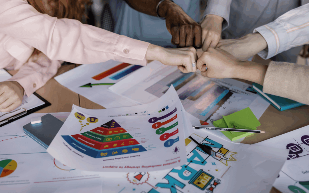 A business seller and team of experts laying out their marketing strategies to sell the business in a competitive market.