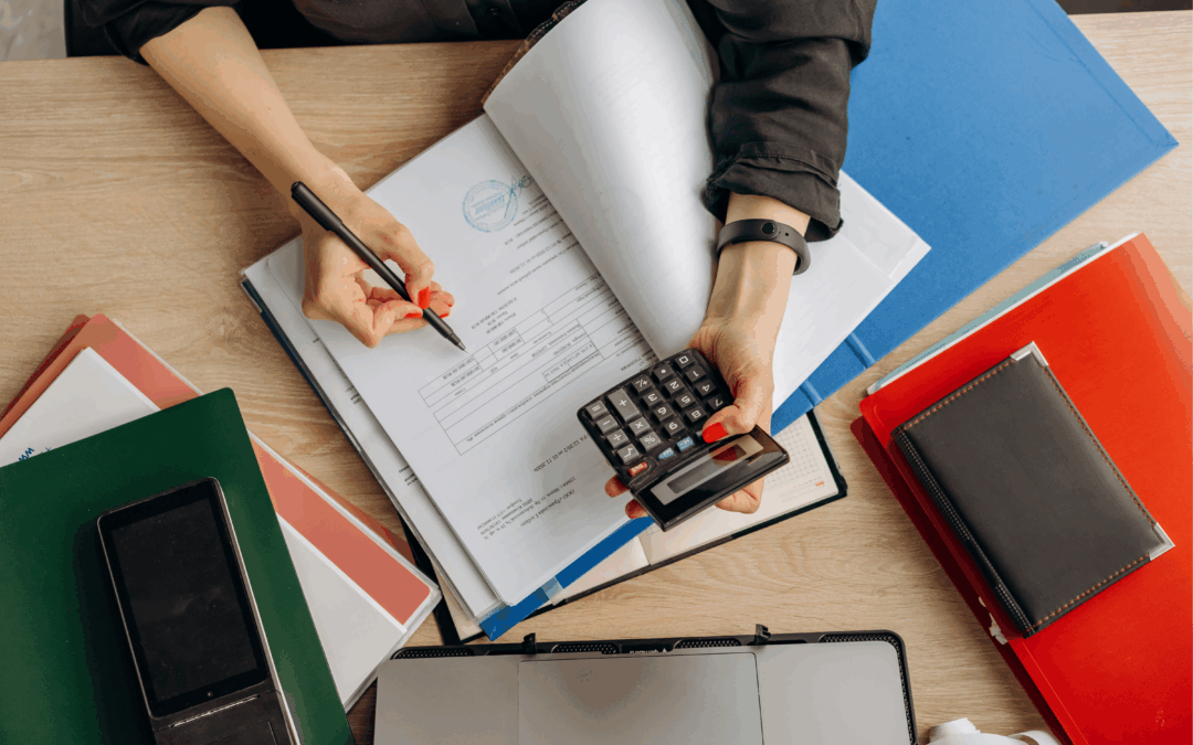 A business seller's team formulates strategies for tax planning before selling the business.